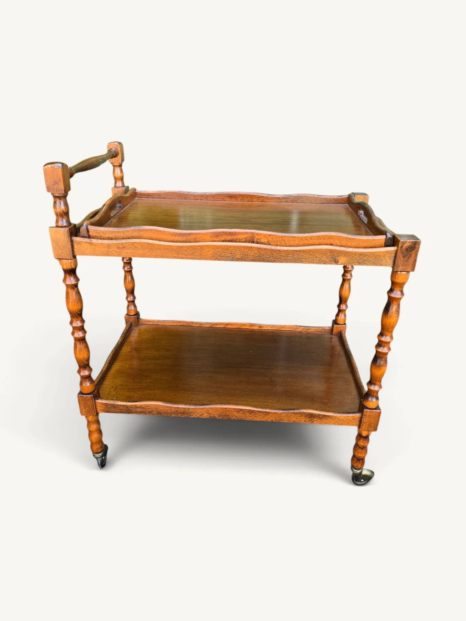 Vintage wooden turned rolling dessert trolley, removable tray.