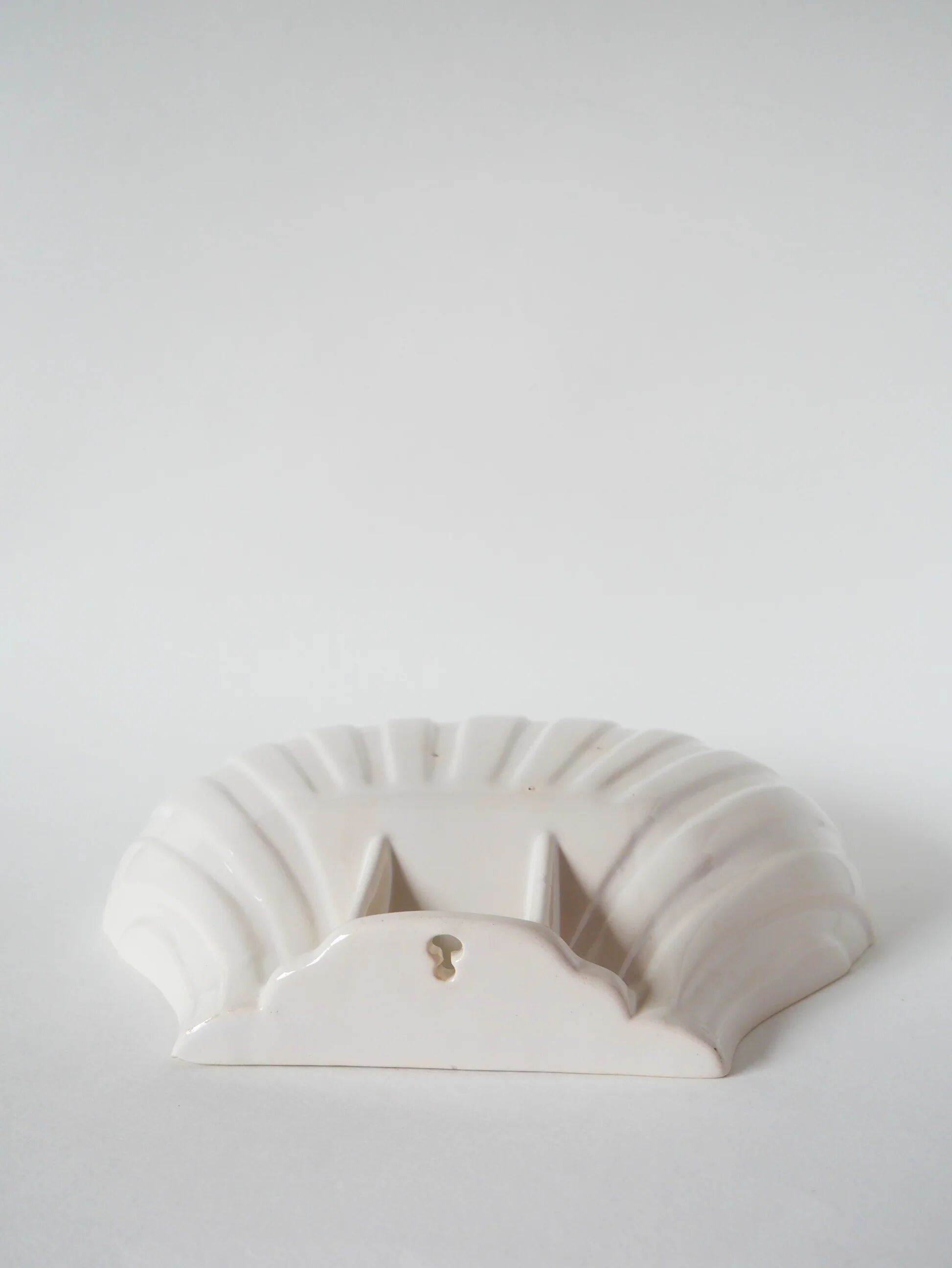 Large shell-shaped bowl to be placed or fixed, 1960.