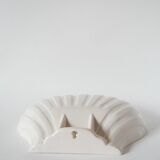 Large shell-shaped bowl to be placed or fixed, 1960.