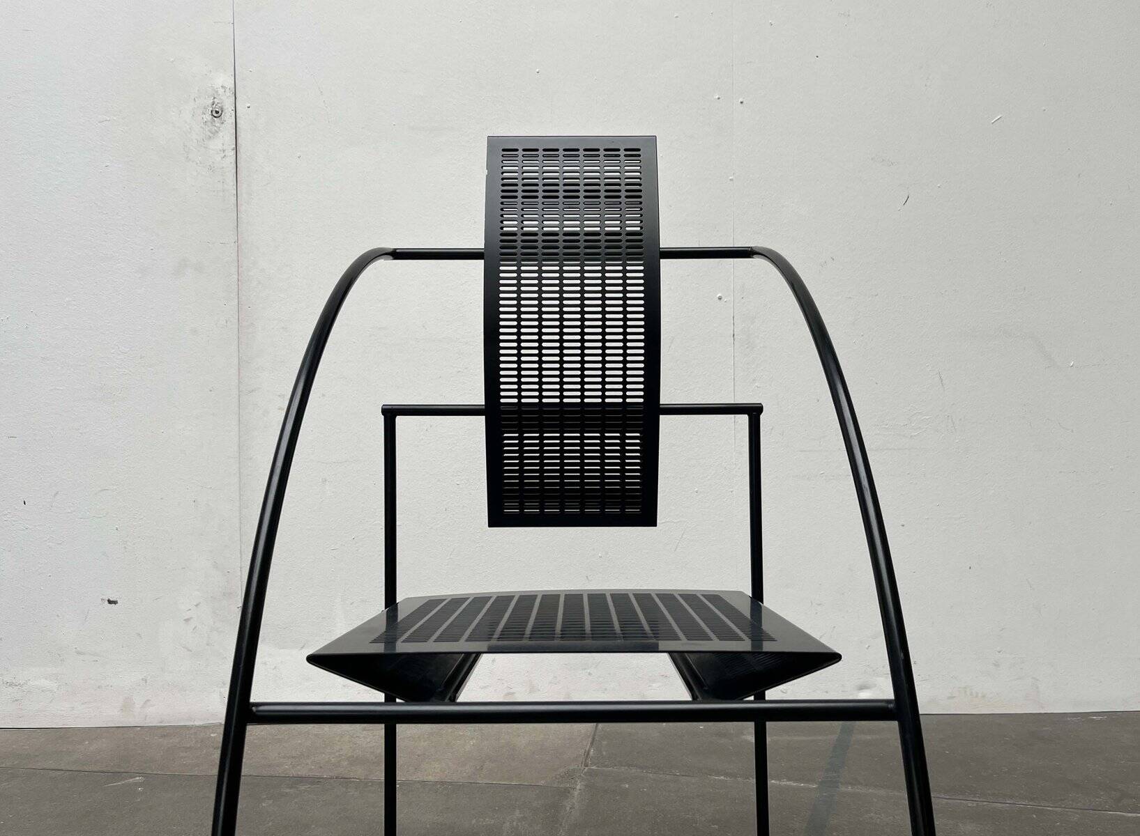 Postmodern black Quinta chair in perforated metal by Mario Botta for Alias, 1980s.