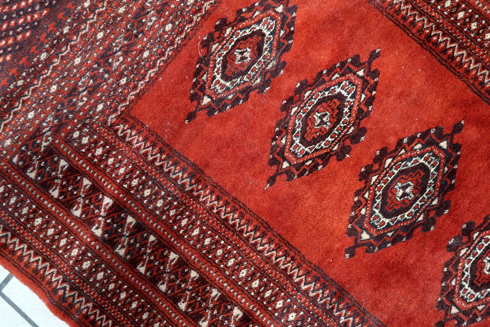 Handmade vintage Uzbek Bukhara rug 91cm x 155cm, 1950s