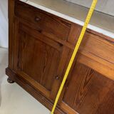 Antique wood and marble kitchen sideboard with carved backsplash