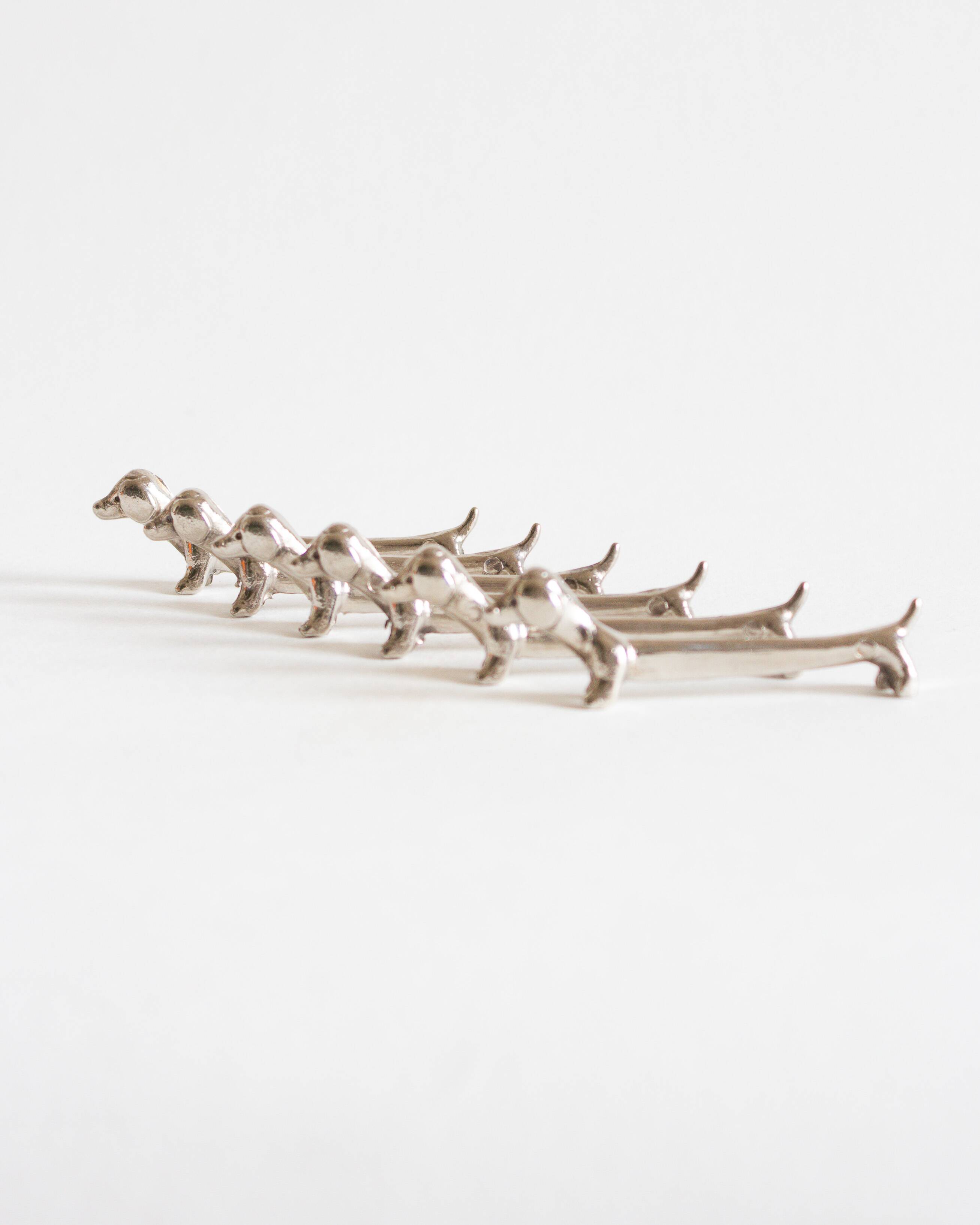 Set of six dachshund-shaped knife holders, 1970s