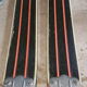 Old skis wooden and its pair of sticks