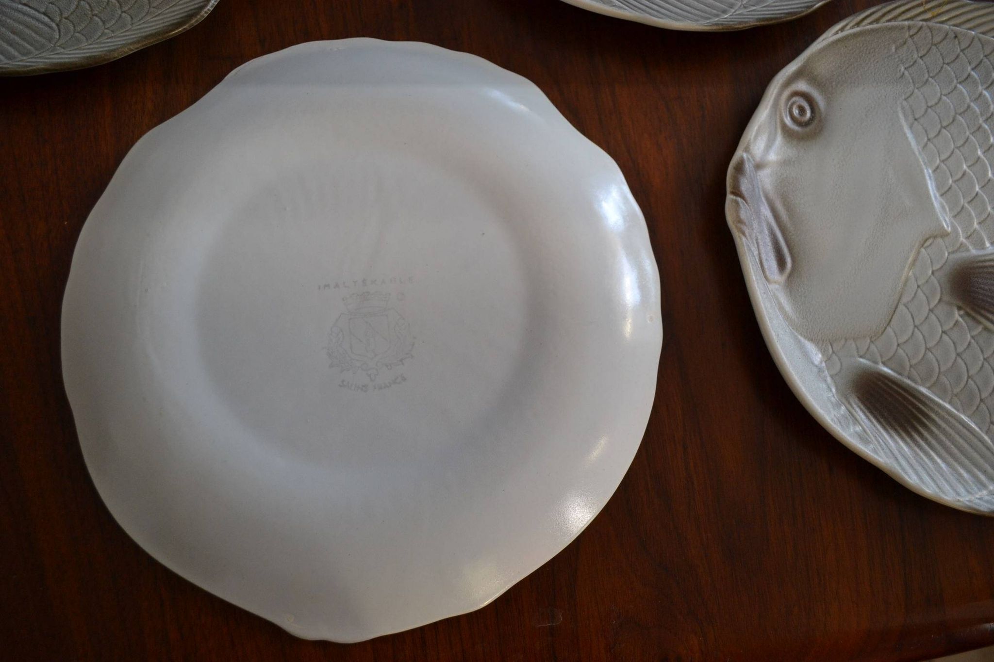 Set of 5 fish plates in earthenware from Salins.