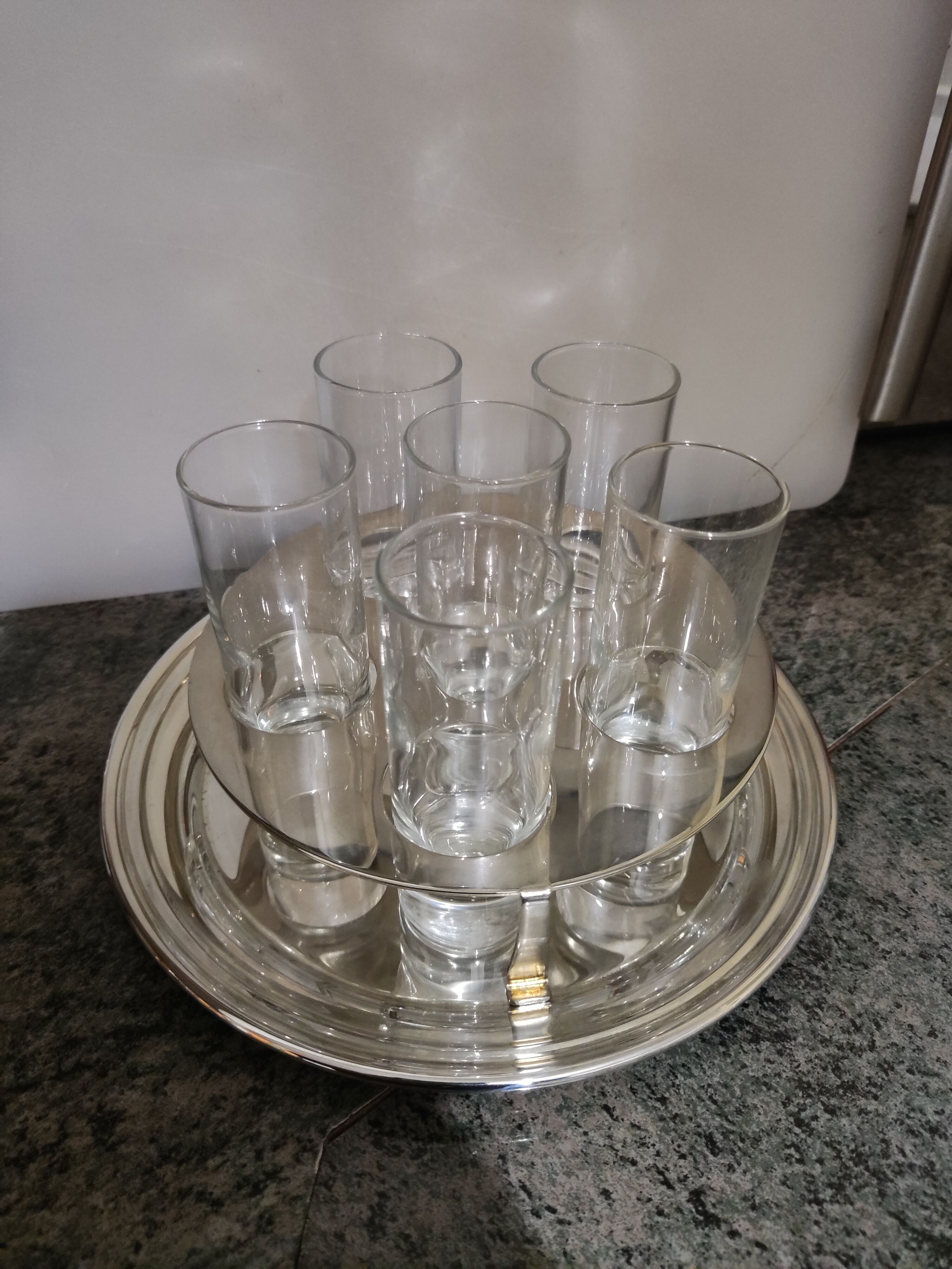 Vodka service with its metal stand