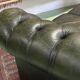 Chesterfield 2-seater green leather sofa from the 1980s