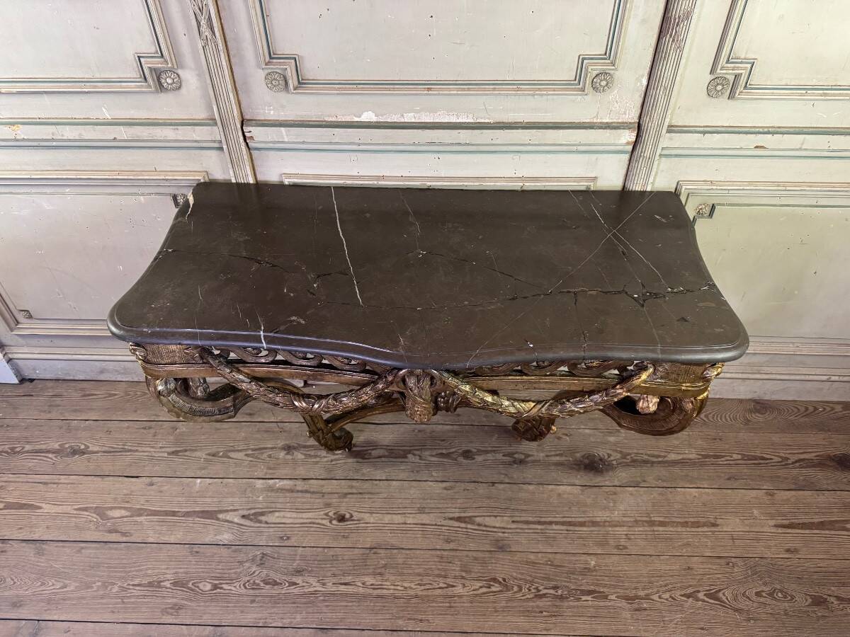 Transitional console in carved and gilded wood, France, 18th century