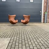 2x Fritz Hansen Egg chair by Arne Jacobsen in Cognac leather, new condition!