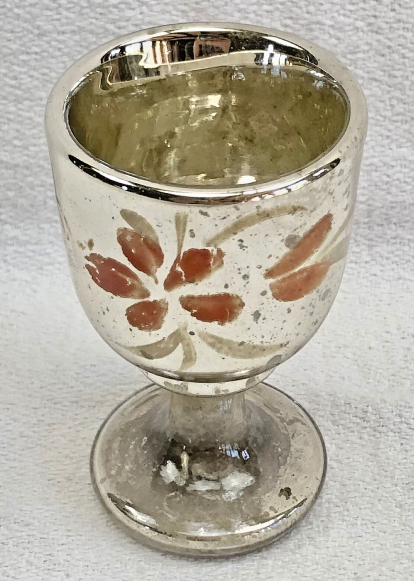 Painted blown glass egg cup with mercury gilding, 19th century.