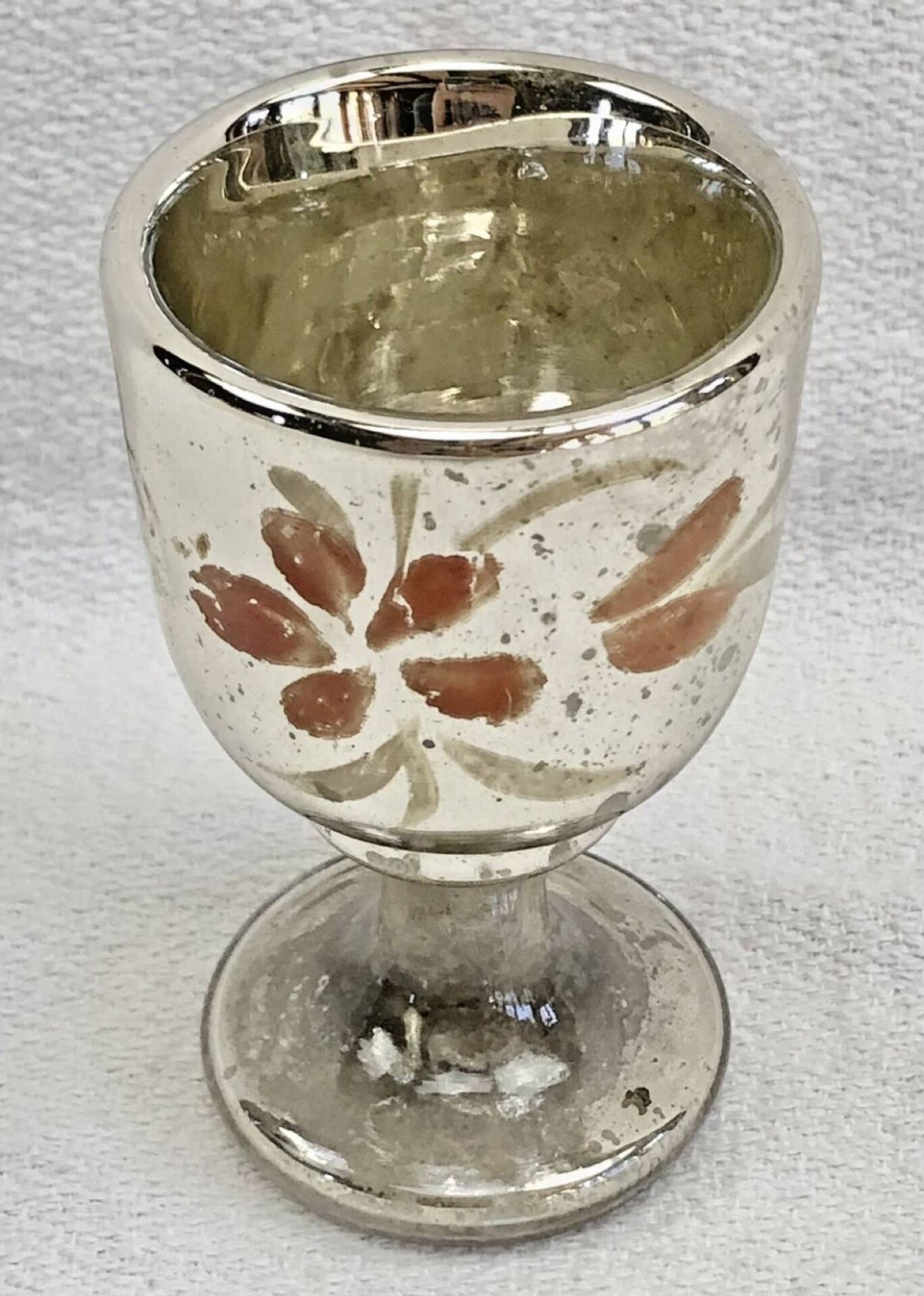 Painted blown glass egg cup with mercury gilding, 19th century.