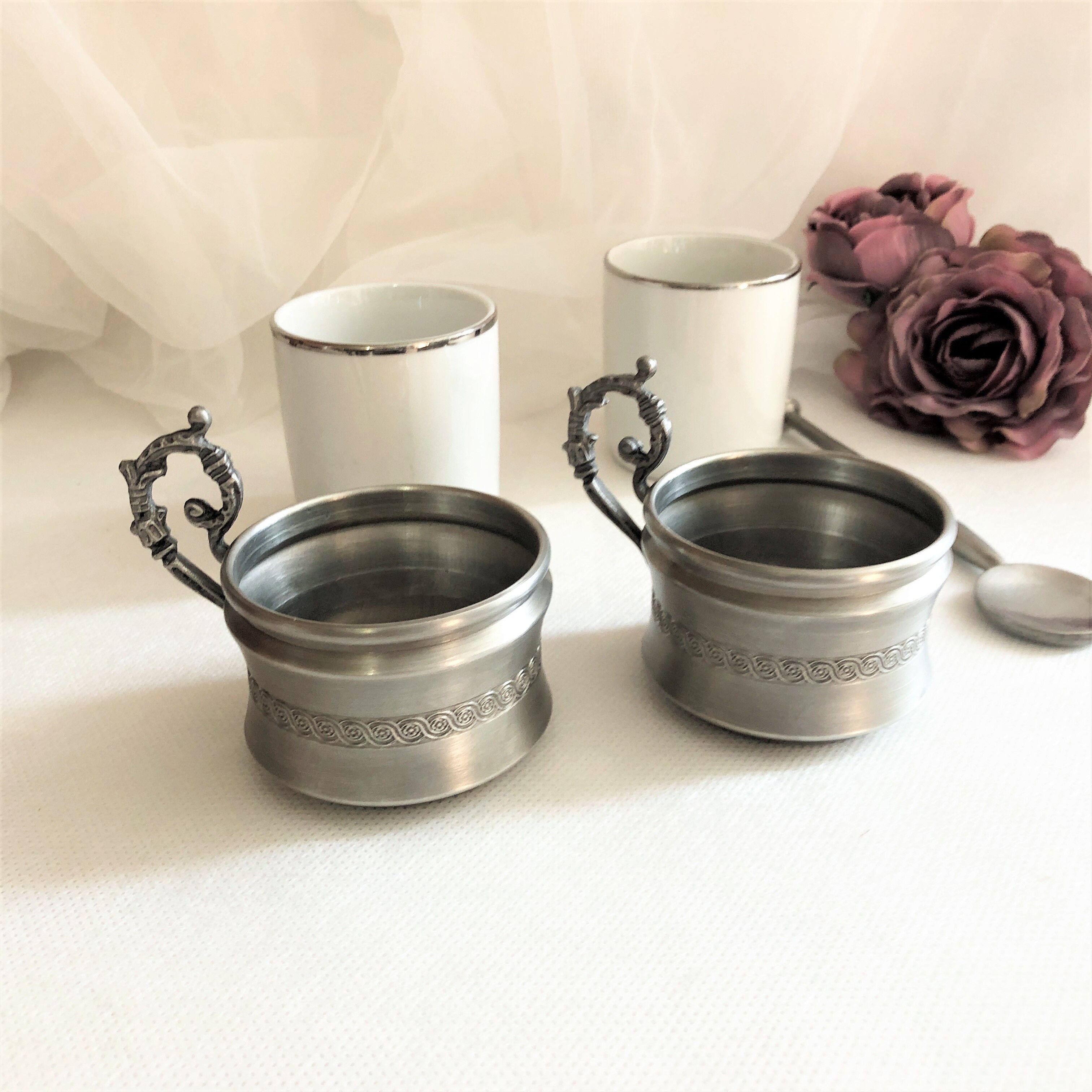 Set two porcelain cups with pewter support