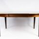 Table à manger en palissandre avec deux plaques d’extension, de design danois des années 1960.
