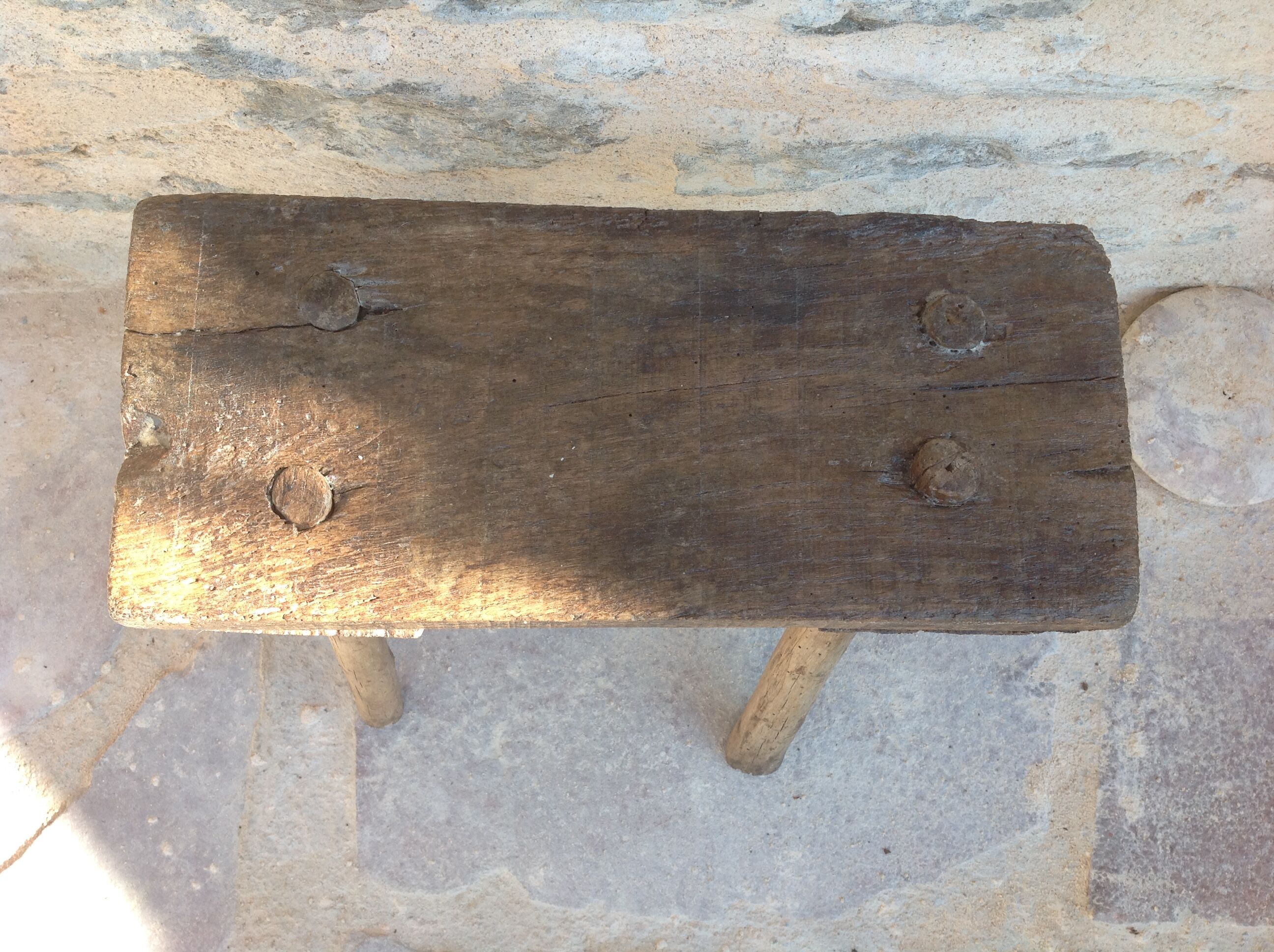 Brutalist milking stool in solid wood