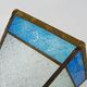 Pair of oriental triangle wall lights in copper and transparent and blue glass. 1970s