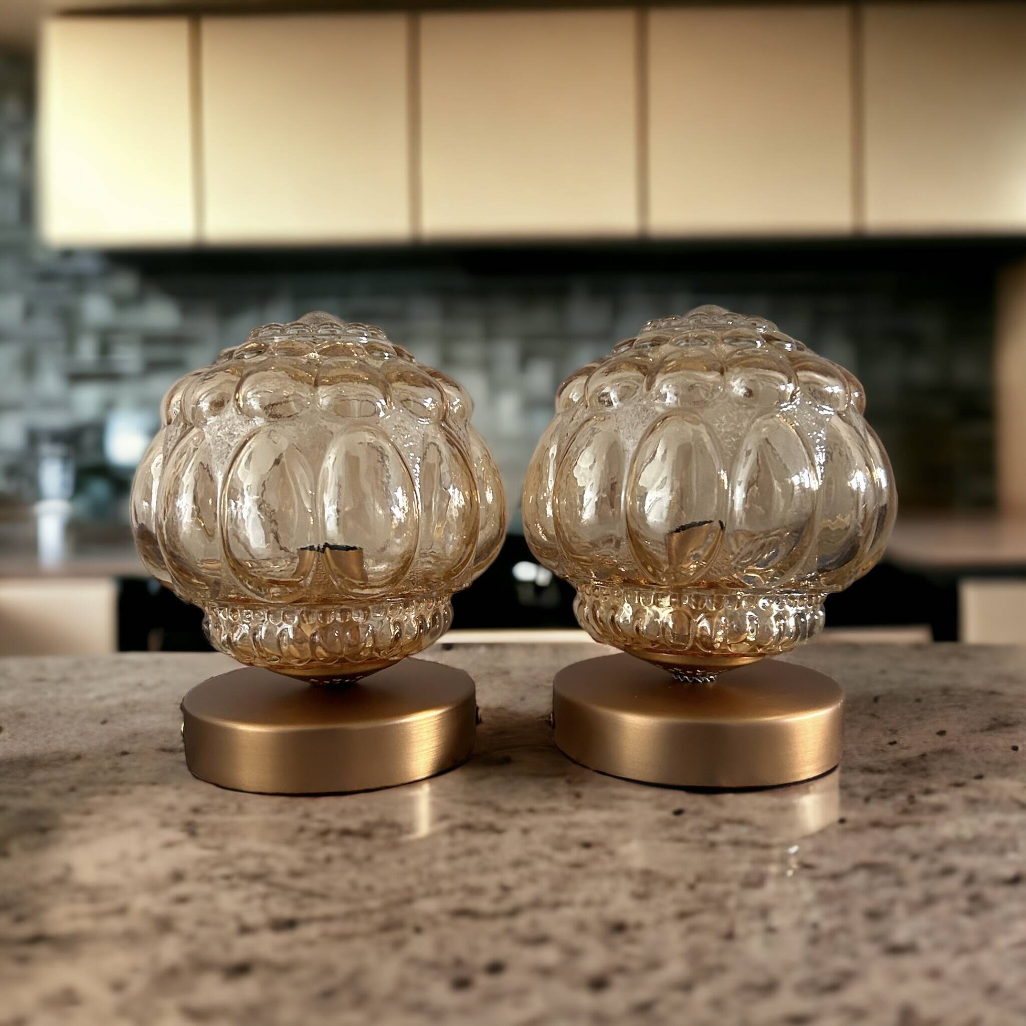 Pair of Scandinavian golden globe wall lights