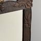 Arts & Crafts hand-carved wall mirror with floral roses, early 20th century