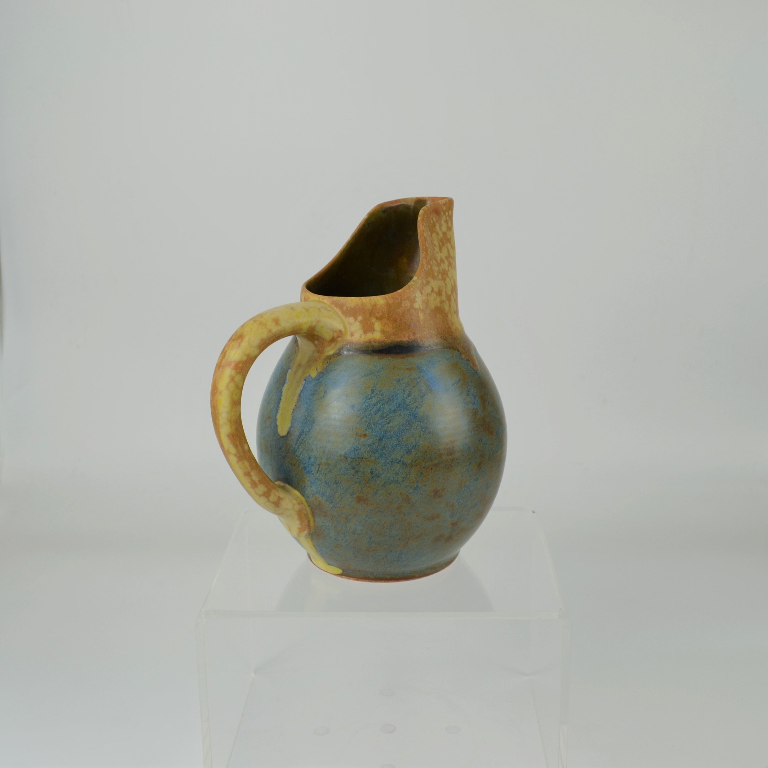 Two-tone pitcher in sandstone by Louis Lourioux