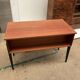 Elegant vintage desk with black legs made in the 60s
