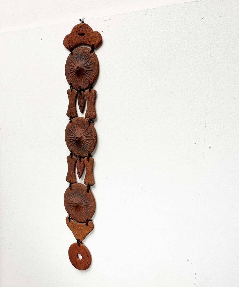 Wall suspension of Danish studio pottery in mid-century brutalist modernist style by Clara Helmich, 1979.
