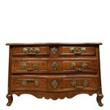 Curved Louis XV period chest of drawers in walnut and gilded bronze from the 18th century