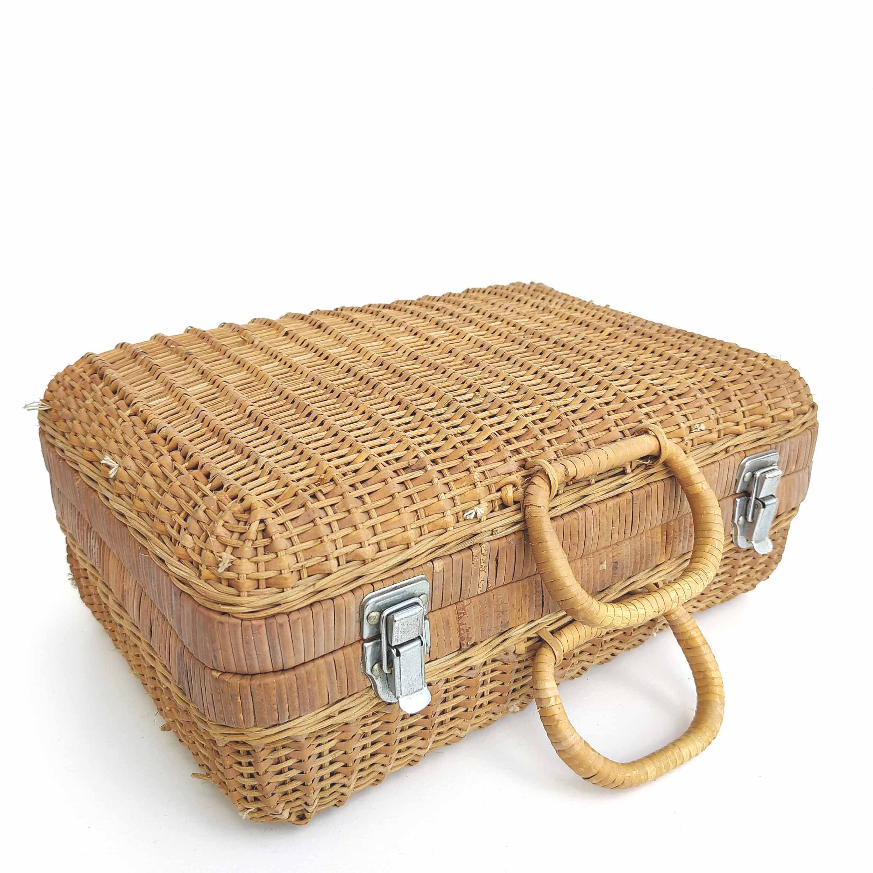 Rattan suitcase and wicker interior flowered