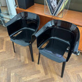"Papyrus" black armchairs designed by Ronan and Erwan Bouroullec.
