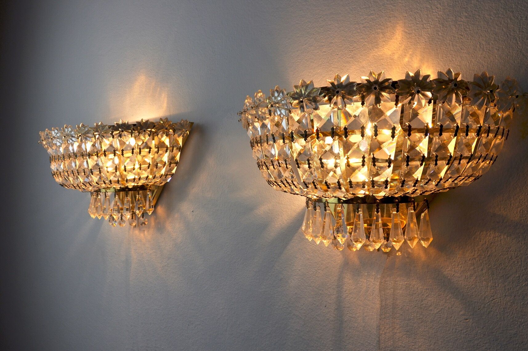 Pair of Regency wall lamps, cut crystals, Italy, 1980