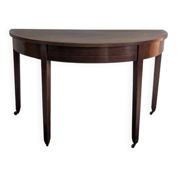 Old half-moon table or serving trolley on wheels