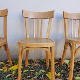 4 chaises de bistrot dont estampillée Baumann