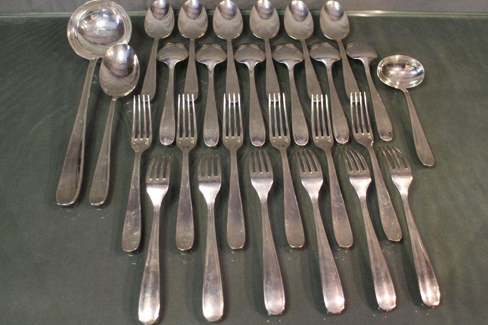 Silver metal housewife signed Christofle spoons and forks