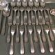 Silver metal housewife signed Christofle spoons and forks