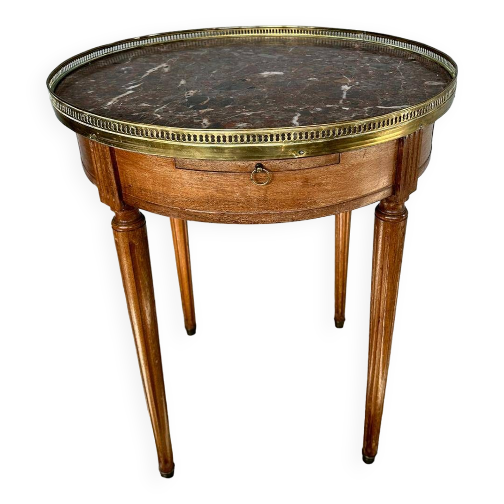 Hot water bottle table with a marble top and a brass gallery.