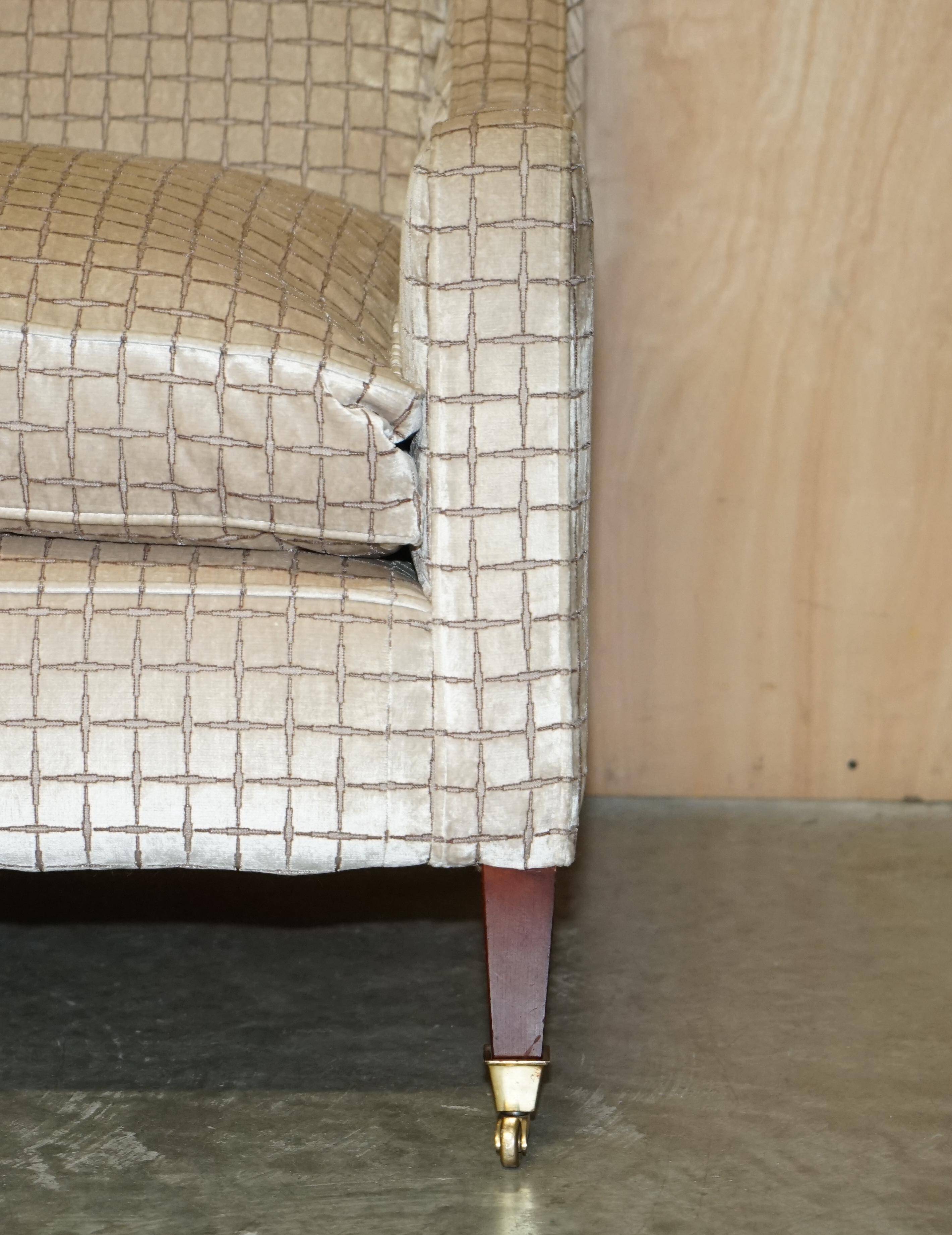 Fabric sofa and footstool, handmade in England.