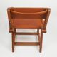 Leather armchair by Jacques Adnet