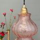 Suspension globe vintage en verre granité rose