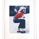 Framed photograph of Farrah Fawcett on a skateboard, 1976, digital print.