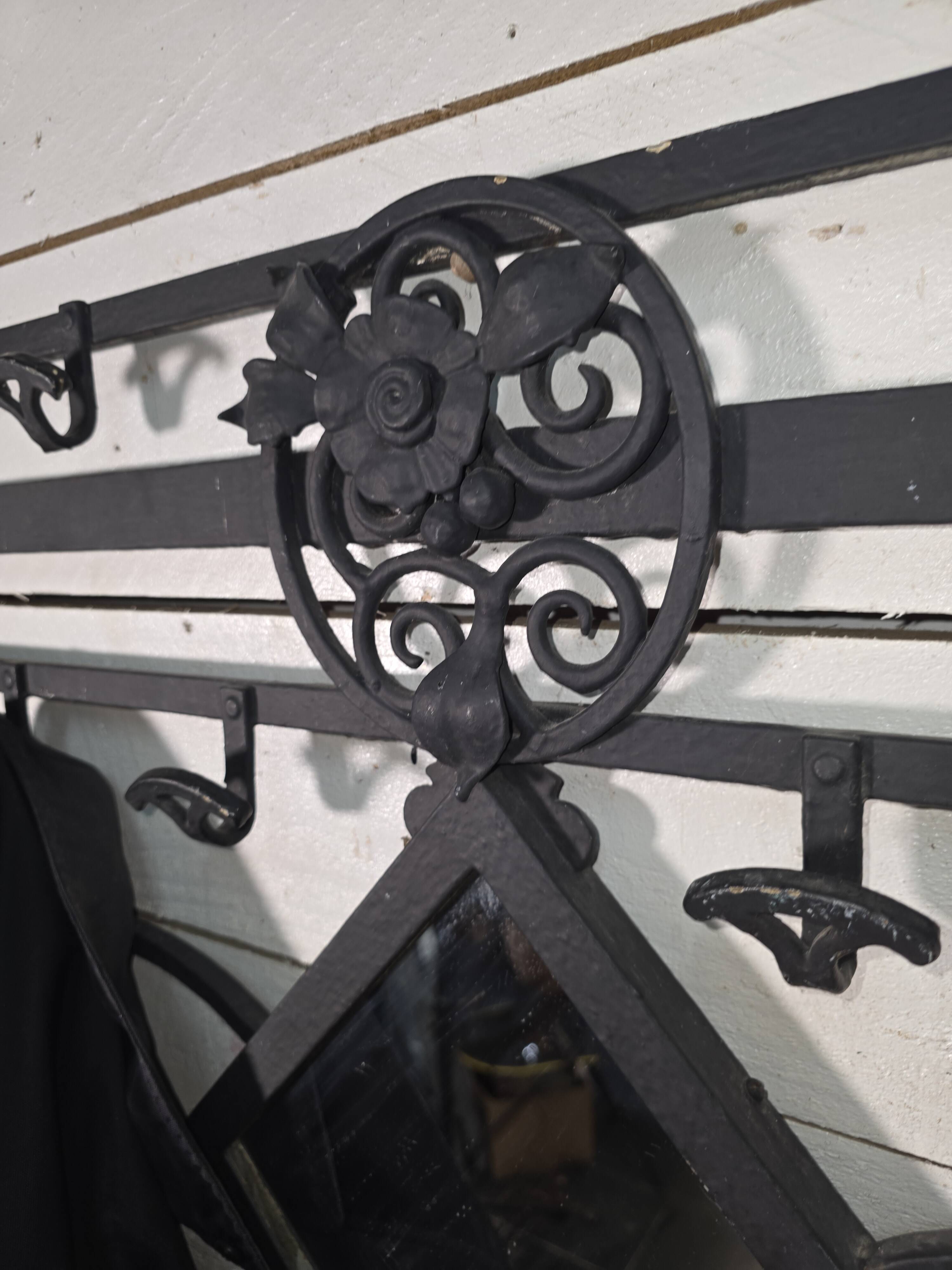 Art Deco coat rack wardrobe in wrought iron from the 1930s.
