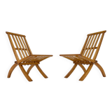Ensemble de deux chaises pliantes en hêtre, conçues par l'architecte Otto Rothmayer.