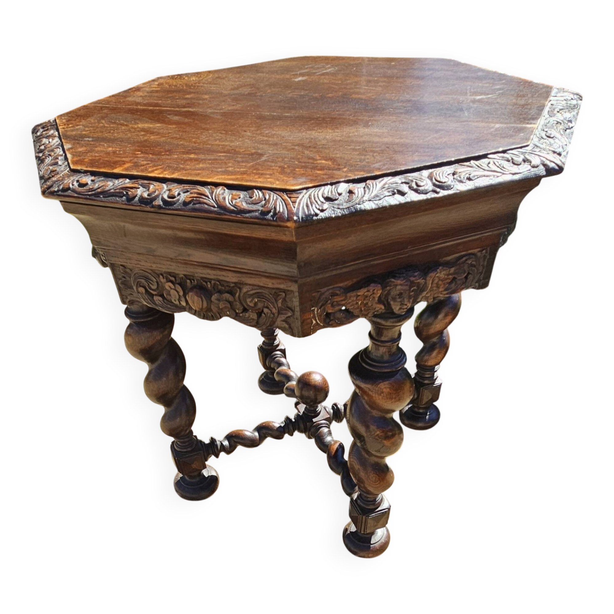 Large octagonal table in carved solid oak.