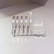 Porte-toast en argent massif Art Déco avec plateau assorti, beurrier en cristal et couteau.