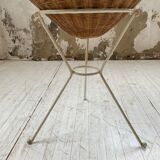 Wicker garden basket on tripod support