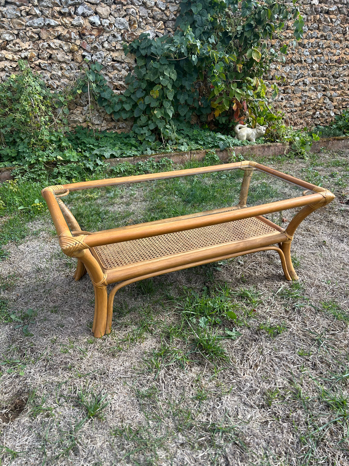 Light rattan coffee table with vintage 1970s caning.