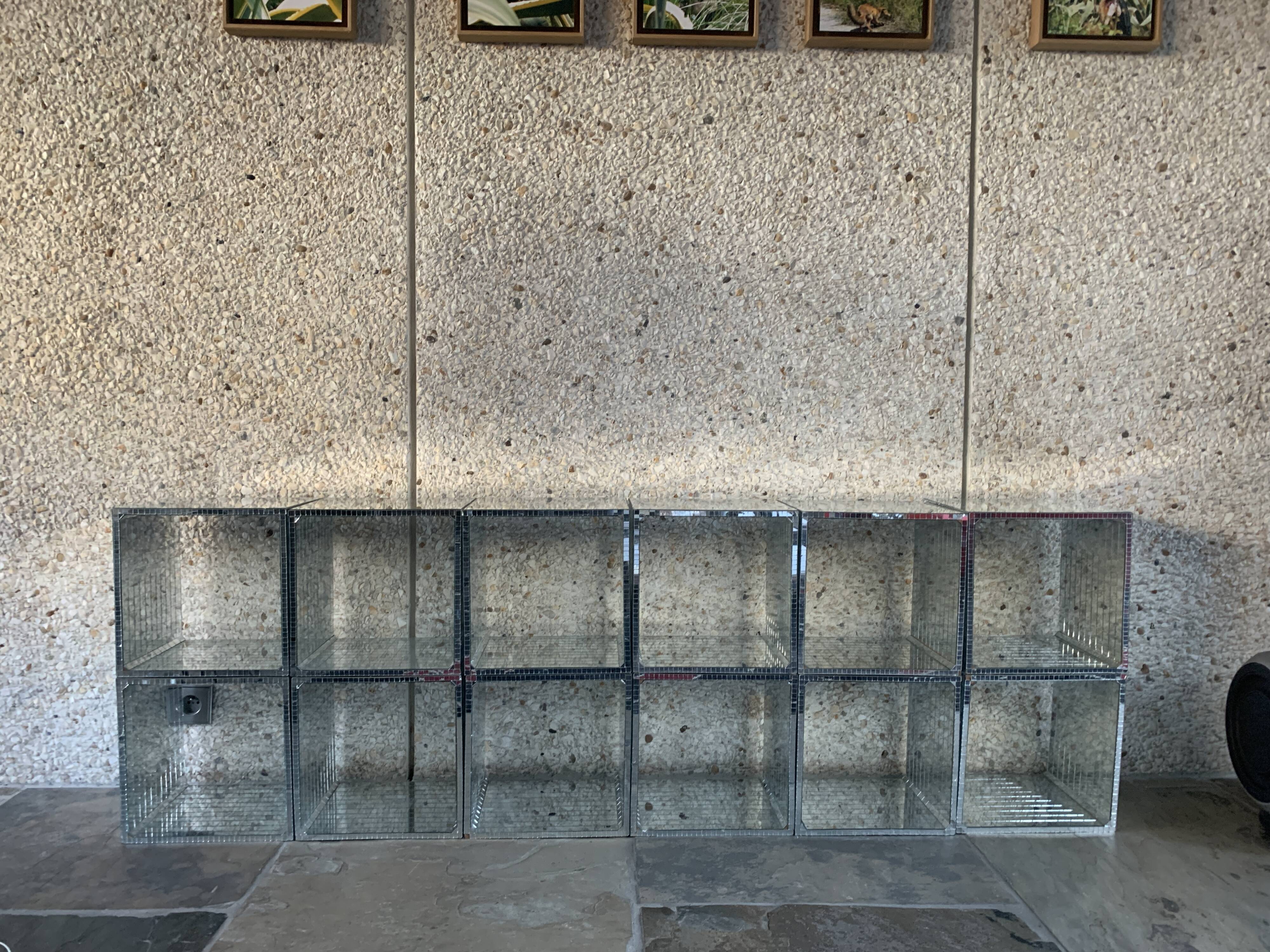 Modular bookcase, shelves composed of cubes facets of glass desselles