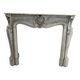 Louis XV style fireplace in veined white Carrara marble, 19th century.