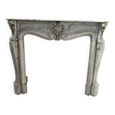Louis XV style fireplace in veined white Carrara marble, 19th century.