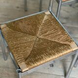 4 chrome and straw chairs