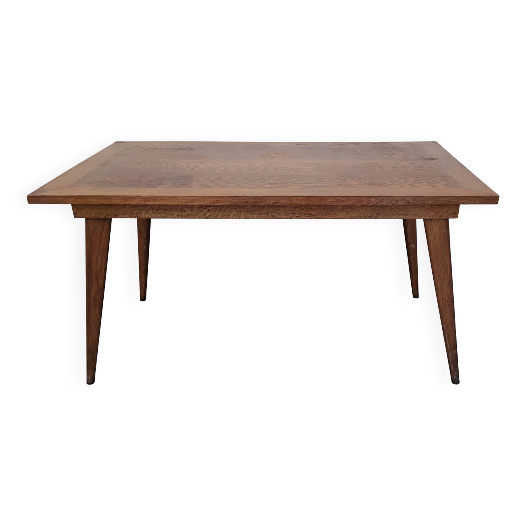 Vintage oak table with tapered legs.