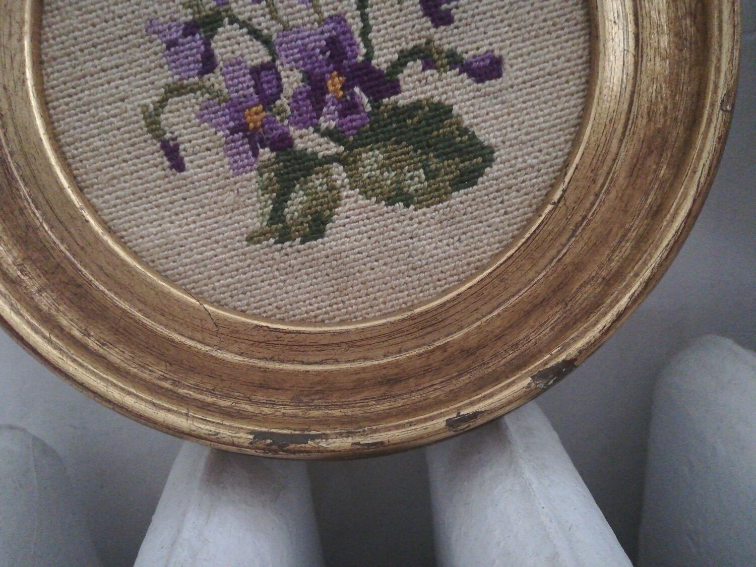 Pair of miniature gold round frames