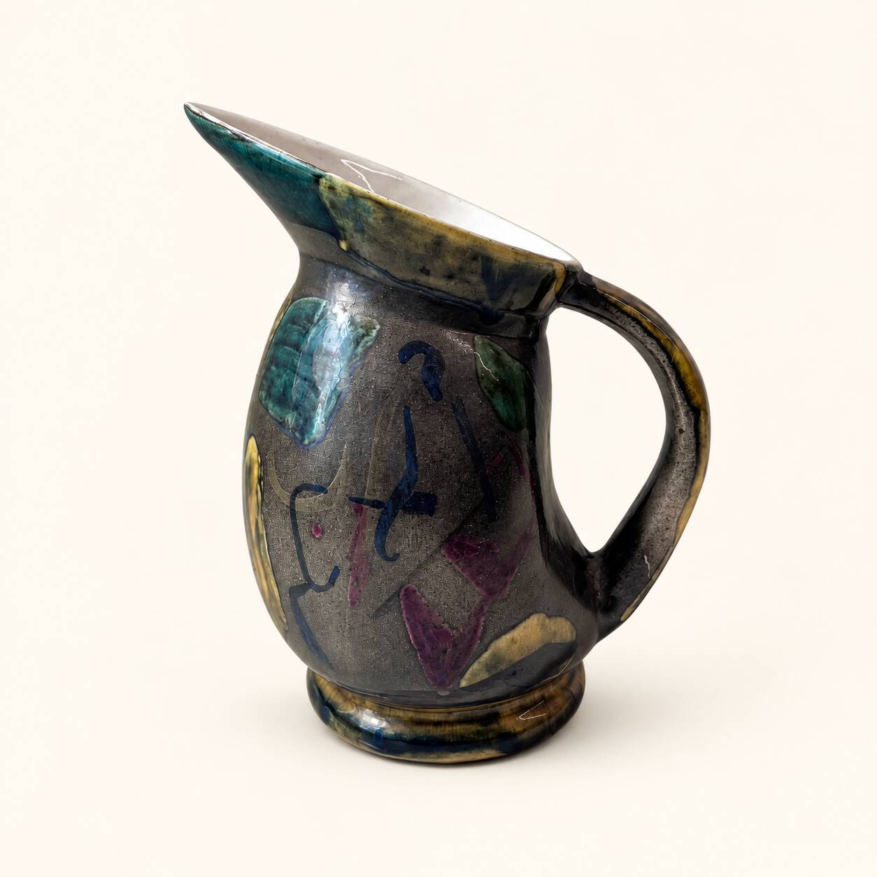 Glazed ceramic pitcher from the 1960s.